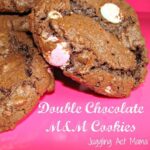 Double Chocolate M and M Cookies on a pink napkin.