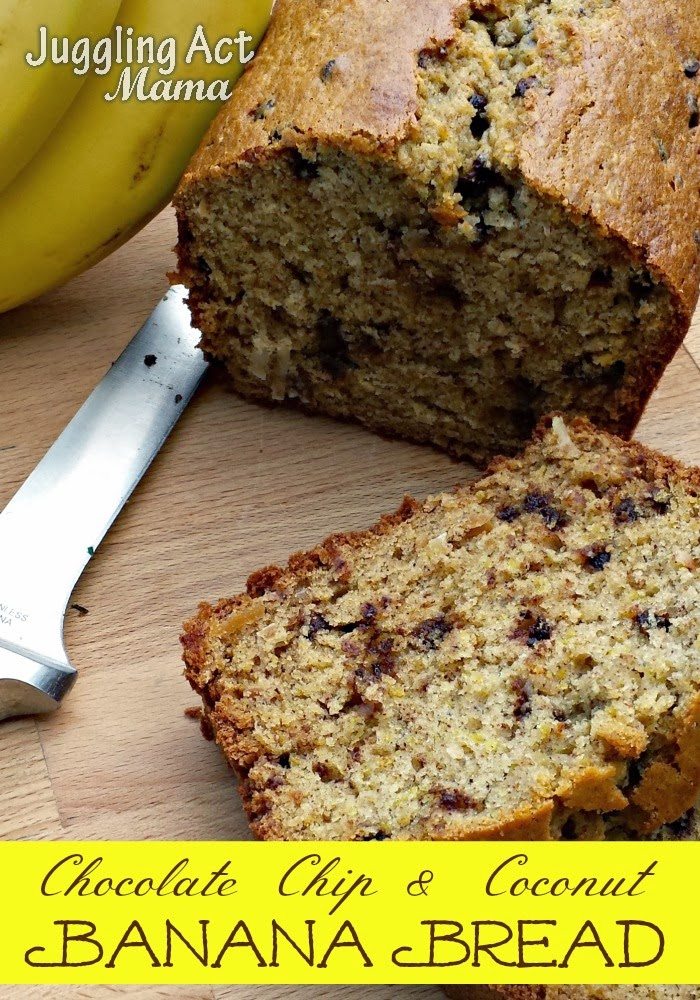 Banana Bread with Chocolate Chips and Coconut on a cutting board with a knife.