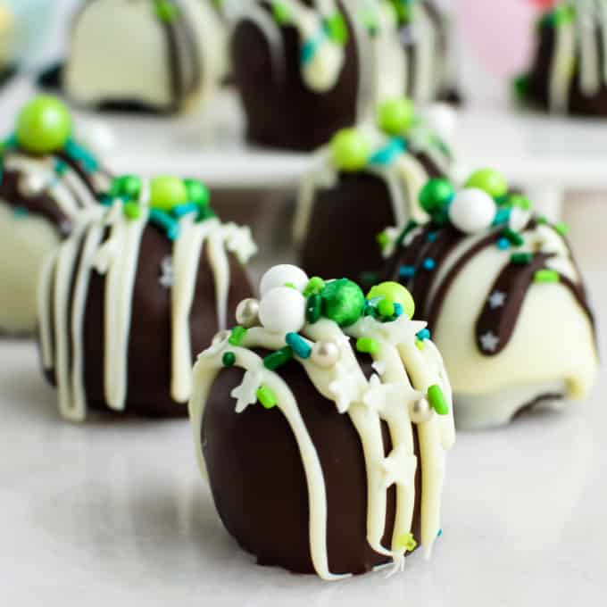 Close up image of an Oreo truffle, topped with sprinkles.