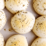 Garlic and Herb Cheese Bombs make a perfect appetizer or great last minute addition to an Italian dinner! #cheese #bread #appetizer