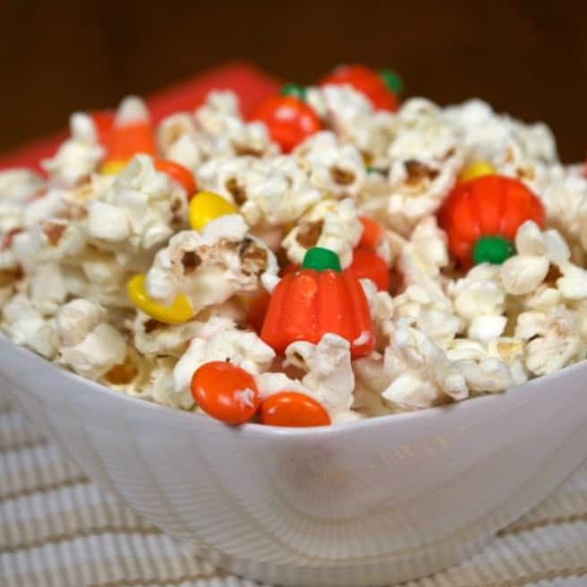 Bowl of White Chocolate Popcorn Mix for Halloween.