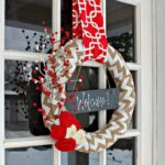 DIY Holiday Wreath on a front door.