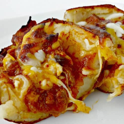 Close up of Potato Skins with Chlii and Cheese.