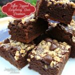 Toffee Topped Raspberry Beer Brownies on a white plate.
