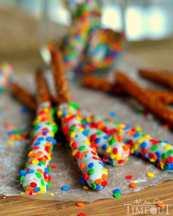 Close up of chocolate dipped Rainbow Pretzel Wands.