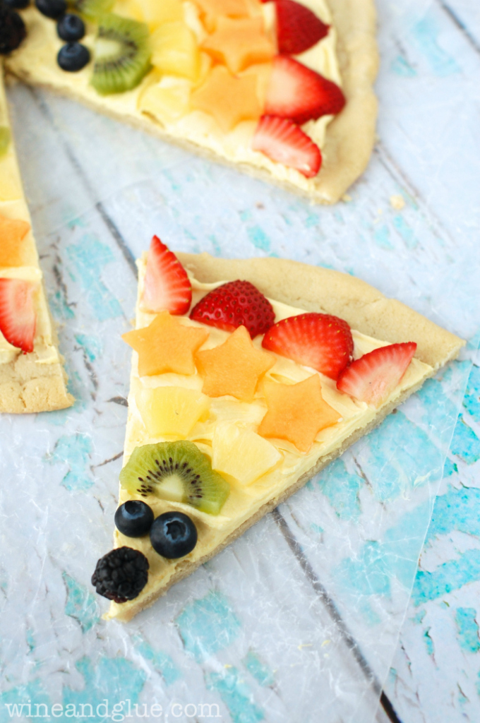 Close up of Rainbow Fruit Pizza with blueberries, kiwi, strawberries and more.