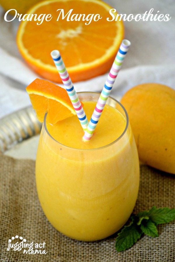Orange mango smoothie with an orange slice.