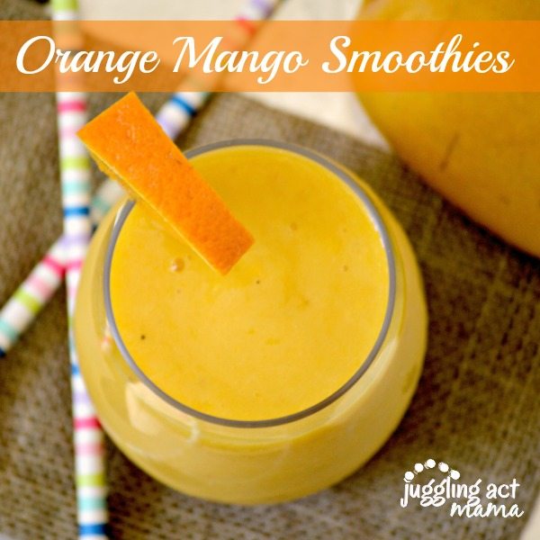 Top down view of an orange mango smoothie.