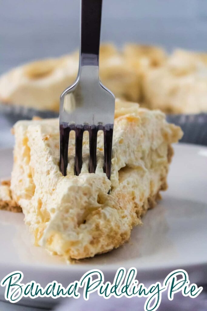Banana pudding pie slice with a fork in it.