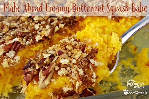 Butternut squash casserole with pecans on spoon.