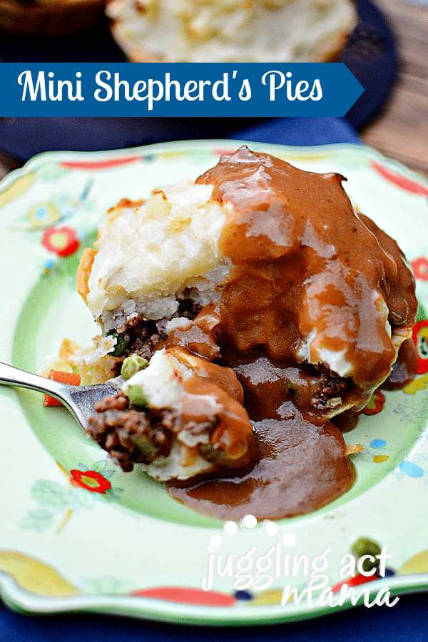 Mini Shepherd's Pie on a plate with a spoon.