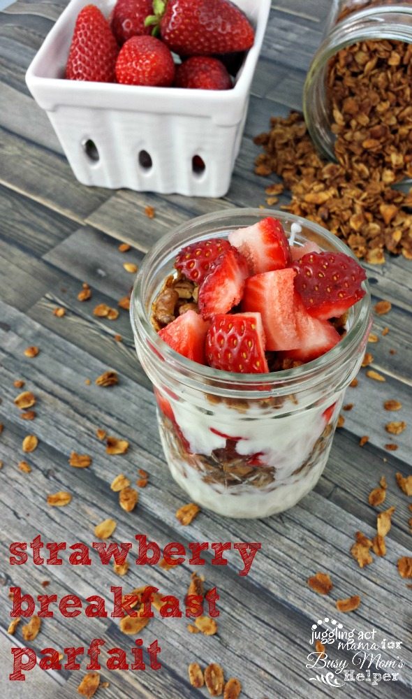 Top down view of Strawberry Parfait with vanilla yogurt and crunchy granola.