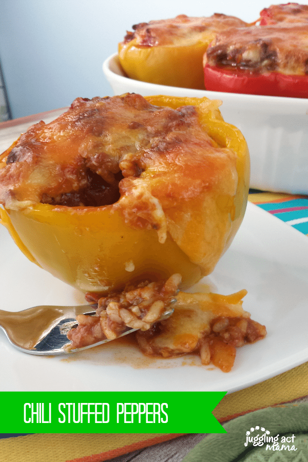 Chili Stuffed Peppers on a plate with a a fork.