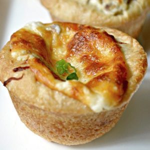 Square image of steak and cheese bombs.