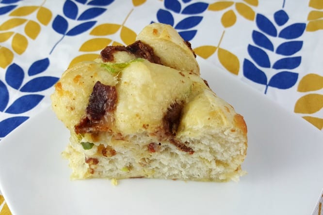 close up of Bundt Cake Breakfast (Bacon Egg and Cheese) on a white plate