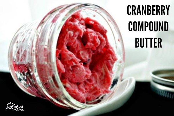 Cranberry Compound Butter in a small mason jar laying on its side.