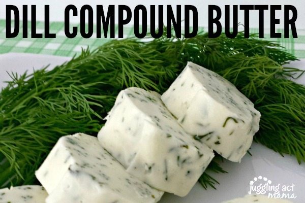 Dill compound butter slices next to fresh dill on a white plate.
