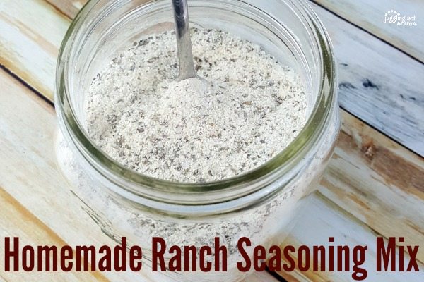 Jar of Ranch Seasoning Mix with a spoon.