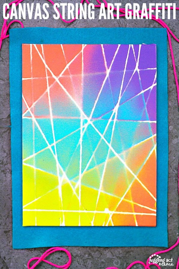 Close up of a string art on canvas project.