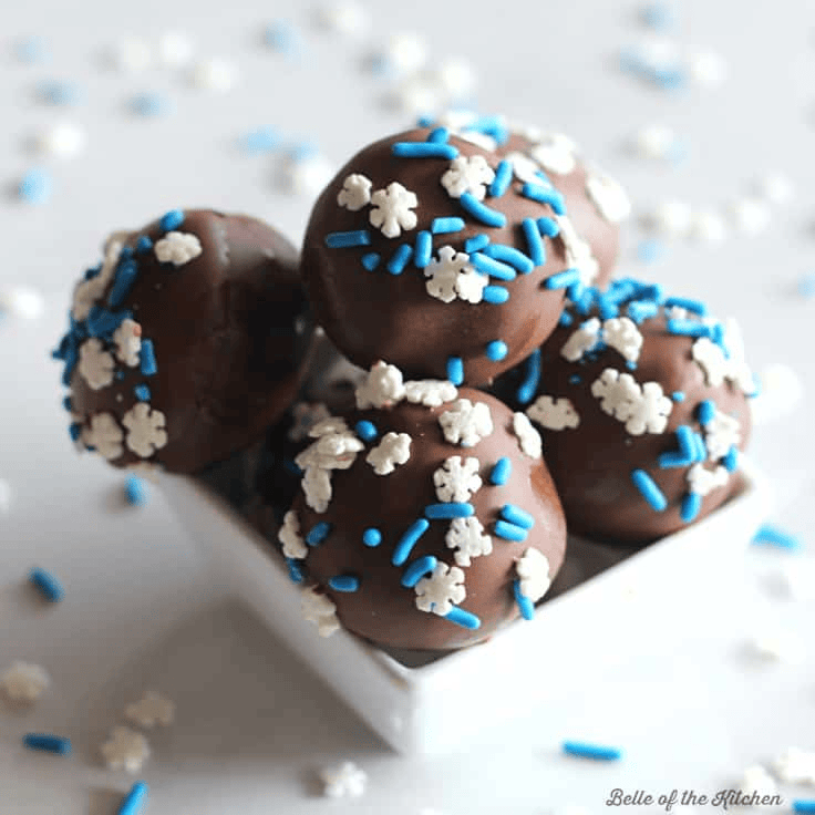 Chocolate Cake Balls in a bowl with sprinkles.