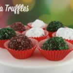 Pretty homemade chocolate truffles on white platter