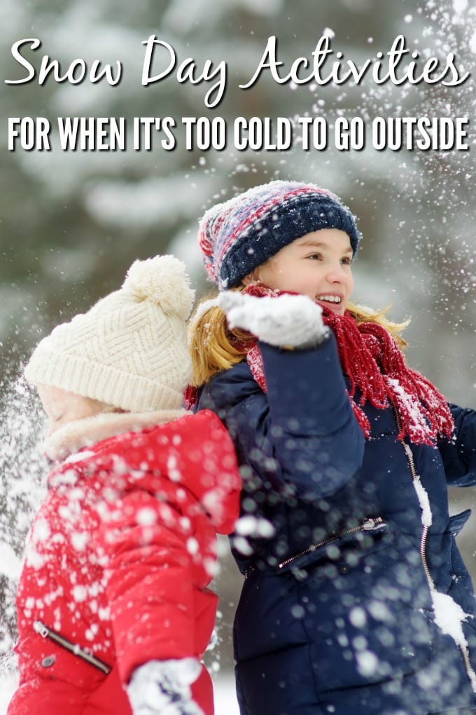 Two children playing in the snow.