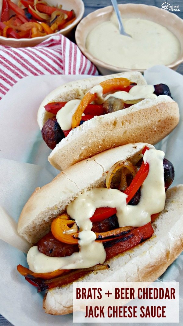 Brats with peppers, onions, and beer cheese sauce.