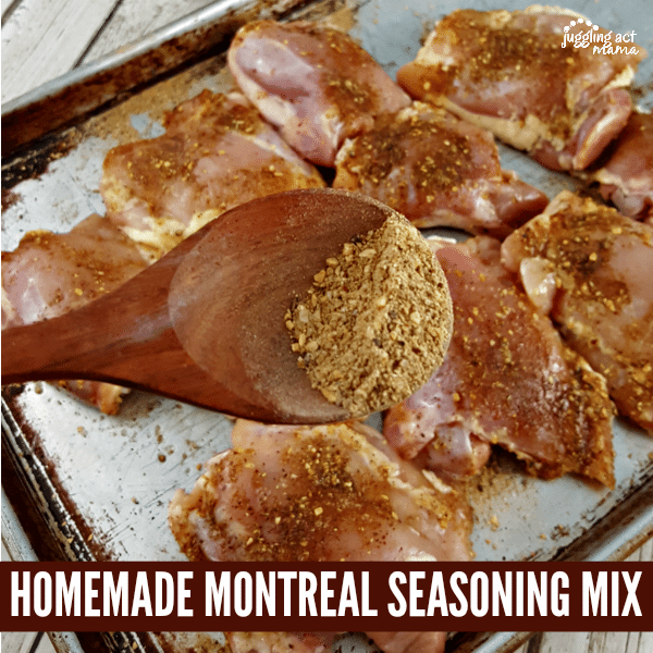 A wooden spoon sprinkling Montreal seasoning mix on chicken.
