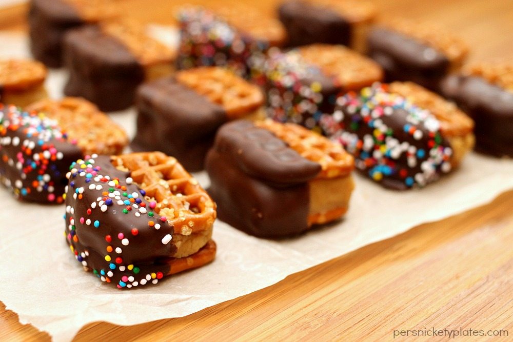 Peanut Butter Cream Cheese Pretzel Bites on parchment paper.