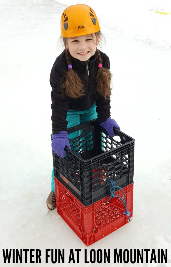 Smiling girl ice skating.