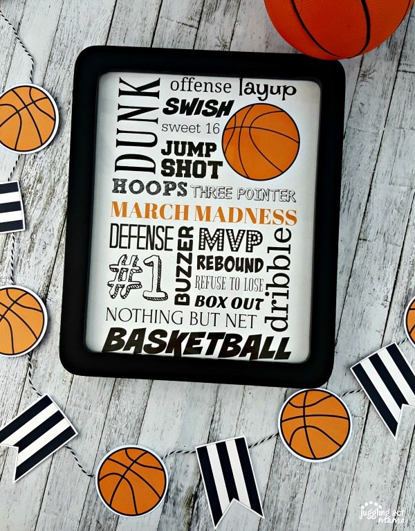 Top down view of March Madness Subway Art Printable with a black and white frame.