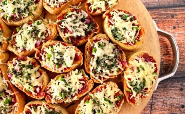 Top down view of mini french bread pizza appetizers. 