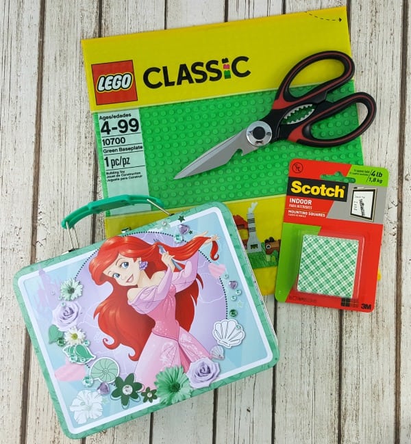 LEGO Flat, snips, metal lunchbox, and mounting squares.