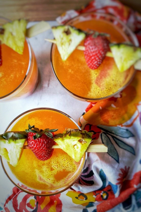 Pineapple Cocktail with strawberry and mango.