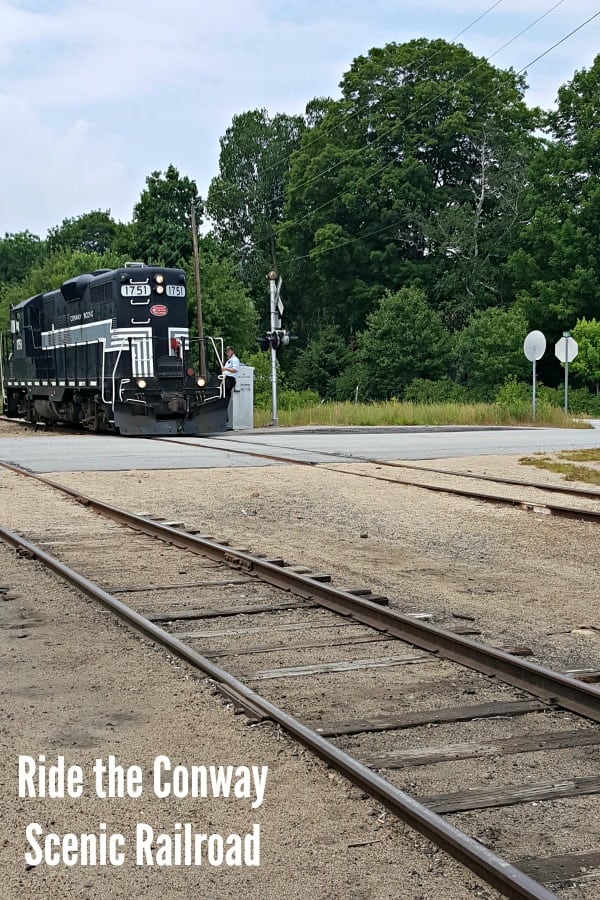 Black locomotor riding the rails of the Conway Scenic Railroad.