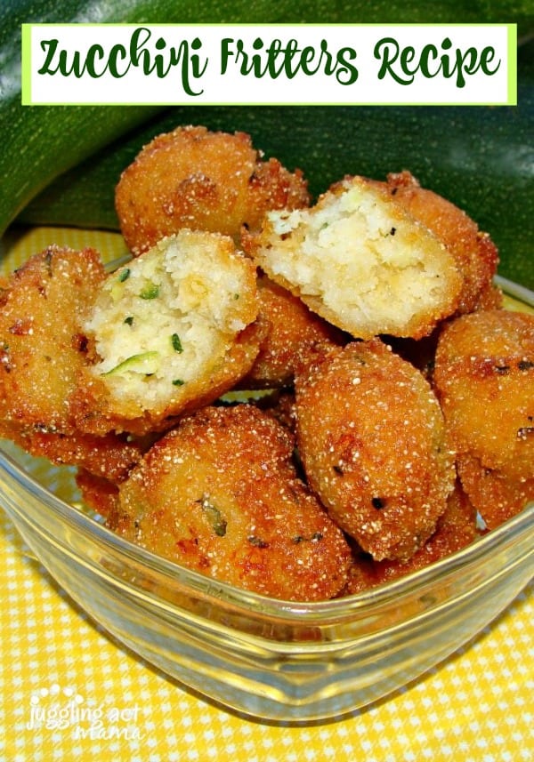Sliced hush puppy on top of a bowl full.