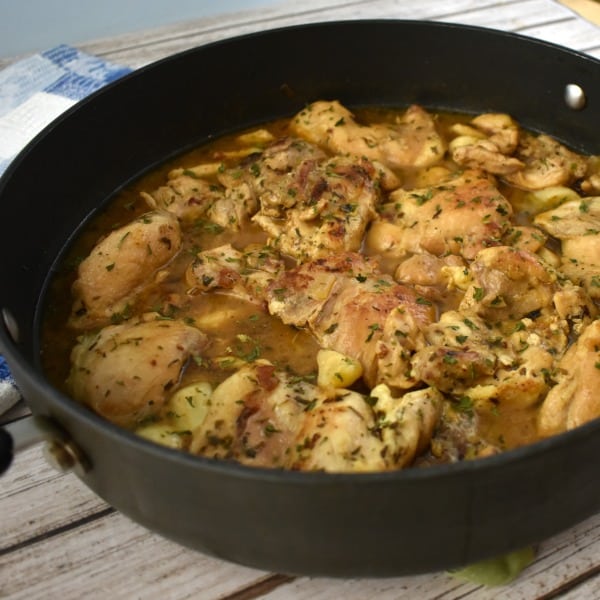 40 Clove Garlic Chicken simmering in an extra large skillet