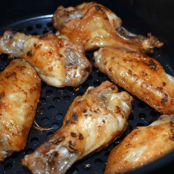 Close up of Easy Garlic Chicken Wings in an air fryer.