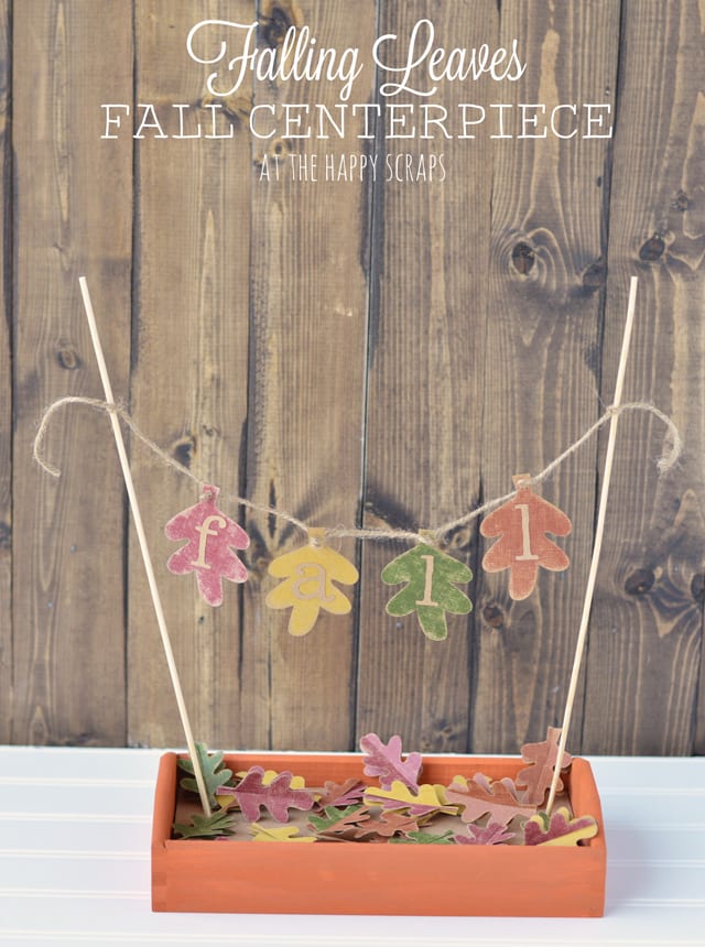 Fall leaves centerpiece on a table.
