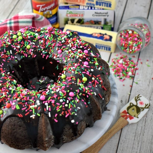Chocolate Cake Recipe with Sour Cream topped with sprinkles.