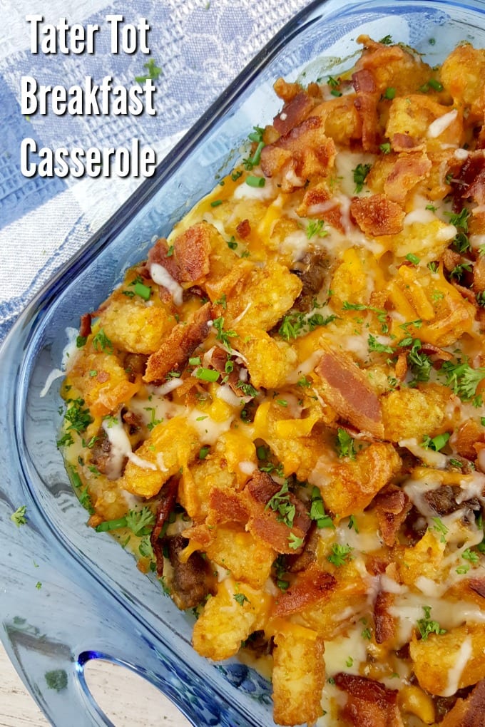 Close up of a Tater Tot Breakfast Casserole in a blue baking dish.