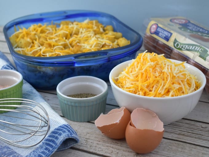 Ingredients for Tater Tot Breakfast Casserole, including eggs and cheese.