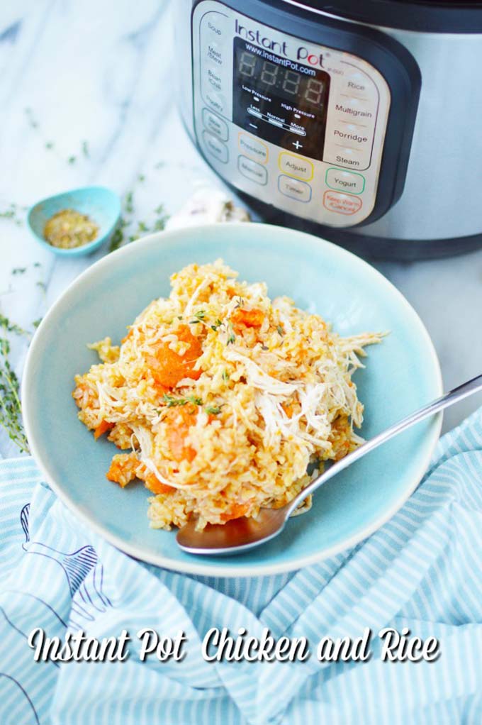 Instant Pot chicken and rice recipe- a blue bowl with brown rice, shredded chicken and sliced carrots next to an Instant Pot