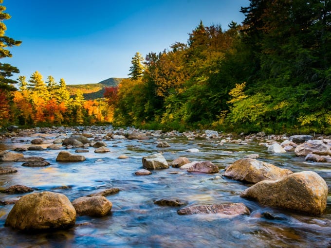 Autumn color along the Swift River, along the Kancamagus Highway in White Mountain National Forest, New Hampshire.