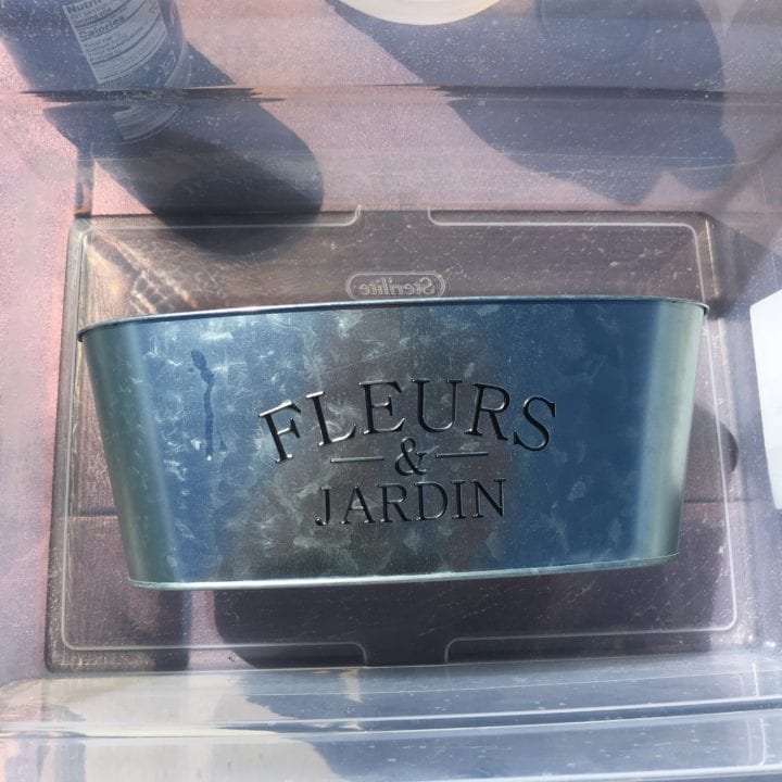 Herb Garden Planter - Small metal planter inside larger plastic container.