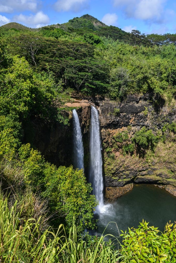 Wailua Falls. The Wailua Waterfall on the island of Kauai flows into the Wailua River. Kauai Island, Hawaii