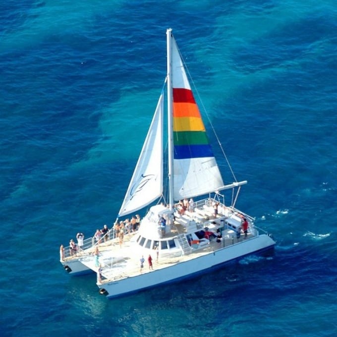 A catamaran in the Pacific ocean off the coast of Kauai