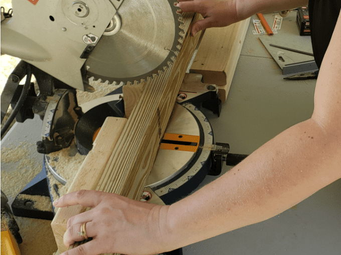 Chop Saw cutting a board.
