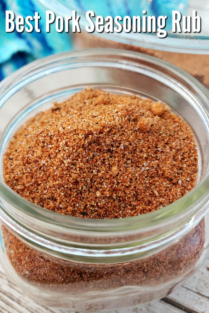 A close up of a small jar of pork rub seasoning.