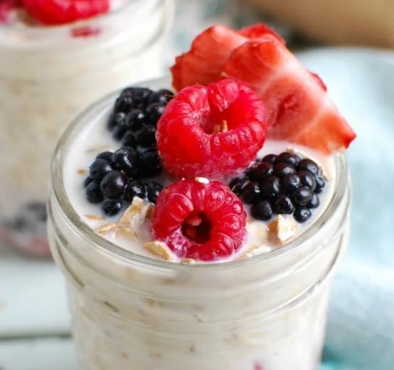 Close uo of Triple Berry Overnight Oats in a jar.